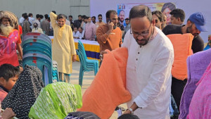খালেদা জিয়ার সুস্থতা কামনায় টুকুর দোয়া মিলাদ ও বস্ত্র বিতরণ