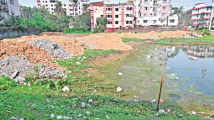 চট্টগ্রামে পাহাড়ি মাটিতে শতবর্ষী পুকুর ভরাট