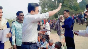 সবুজ চায়ের প্রান্তরজুড়ে সোনালি ধানের বার্তা