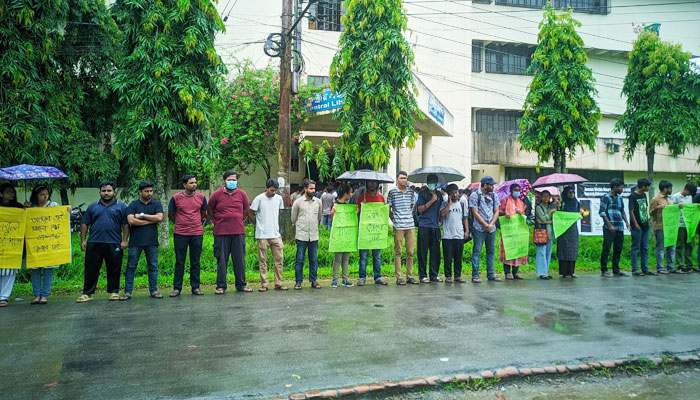 হত্যাকারীদের গ্রেপ্তার দাবিতে শাবির সম্মিলিত সাংস্কৃতিক জোটের মানববন্ধন
